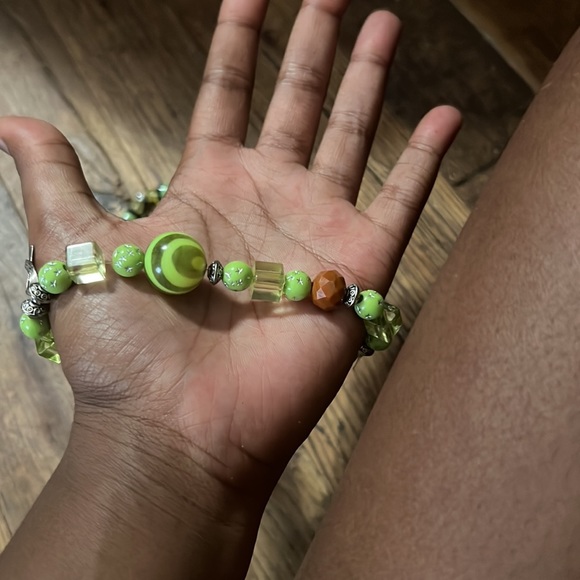 These two green bracelets are a bundle u can get. - Picture 4 of 4